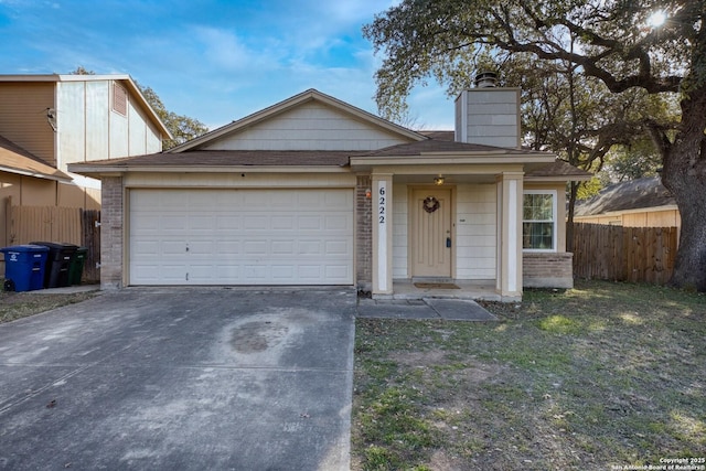 view of front of property with a garage