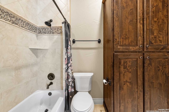 bathroom featuring toilet and shower / bath combo