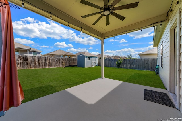 4538 Heathers Rose, Saint Hedwig, TX 78152 - view of patio / terrace with ceiling fan, a storage unit, an outbuilding, and a residential view