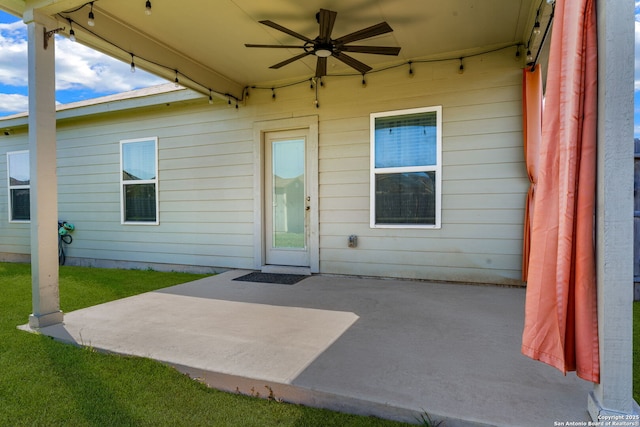 4538 Heathers Rose, Saint Hedwig, TX 78152 - doorway to property featuring ceiling fan, a patio, and a lawn