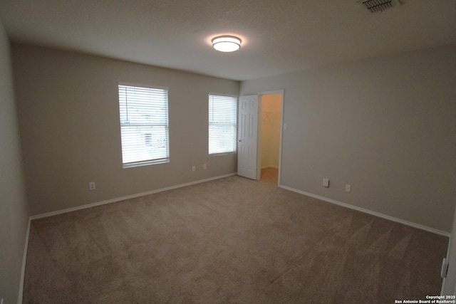 empty room with carpet floors