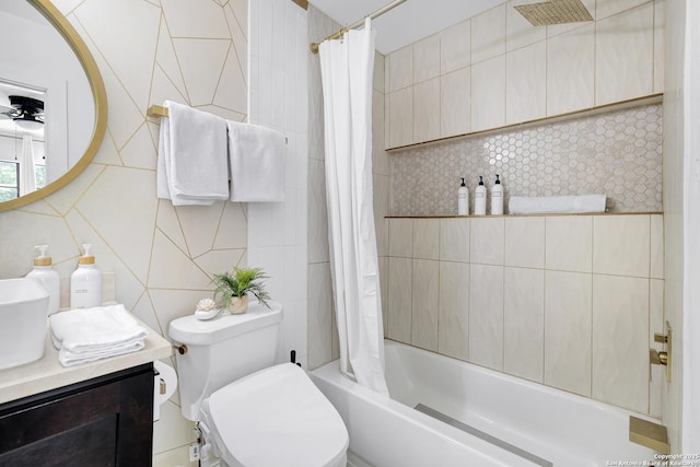 full bathroom with tile walls, vanity, shower / bath combination with curtain, and toilet