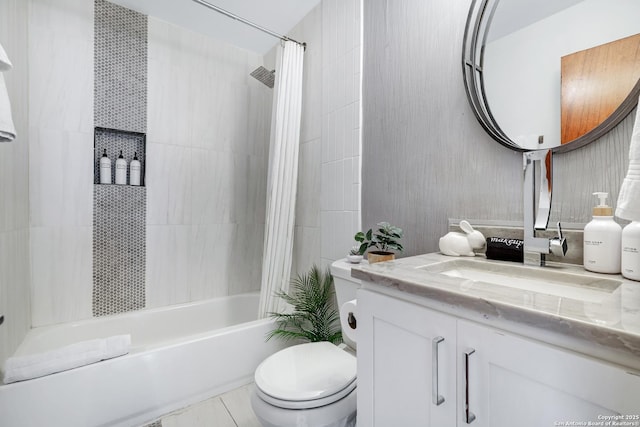 full bathroom featuring vanity, toilet, tile patterned flooring, and shower / bath combo