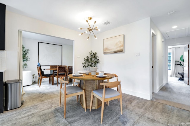 dining area with a chandelier