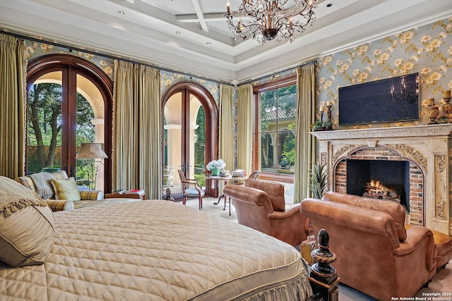 bedroom featuring an inviting chandelier, ornamental molding, coffered ceiling, a brick fireplace, and beam ceiling