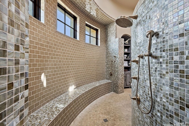 bathroom with tiled shower