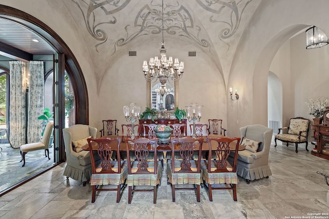 dining area featuring a chandelier