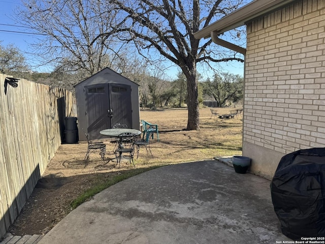 view of patio / terrace with a storage unit