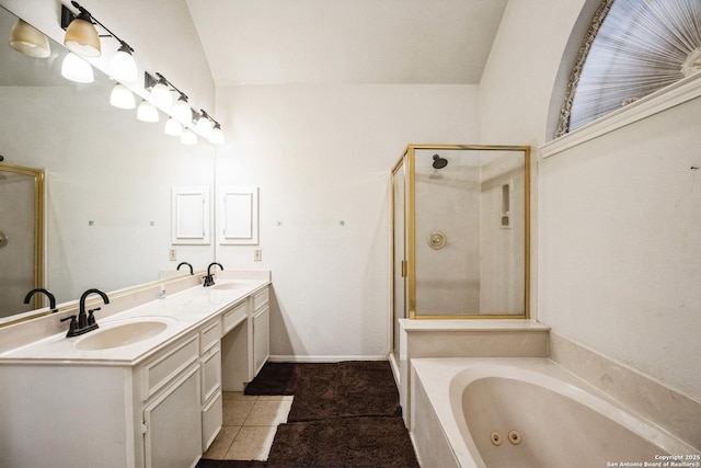 bathroom with vanity, vaulted ceiling, tile patterned floors, and shower with separate bathtub