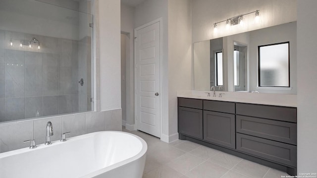 1716 Madden Hvn, San Antonio, TX 78245 - full bath with a tile shower, a soaking tub, vanity, and tile patterned floors