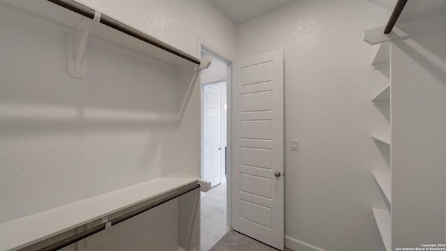 1716 Madden Hvn, San Antonio, TX 78245 - spacious closet with light tile patterned floors