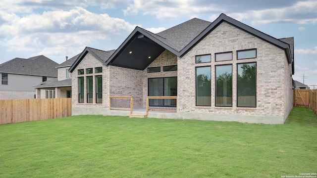 1716 Madden Hvn, San Antonio, TX 78245 - back of house featuring brick siding and a shingled roof