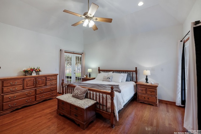 bedroom featuring hardwood / wood-style flooring, high vaulted ceiling, and ceiling fan