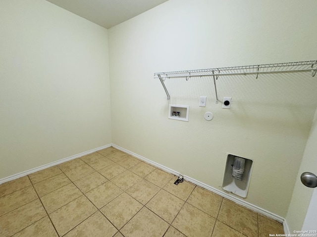 laundry area with gas dryer hookup, washer hookup, tile patterned flooring, and electric dryer hookup