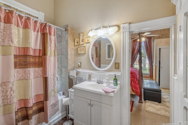 bathroom featuring vanity and ceiling fan