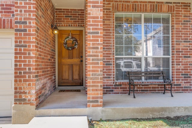 doorway to property with a porch