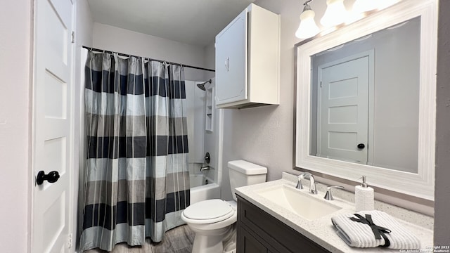 full bathroom with vanity, toilet, and shower / bath combo with shower curtain