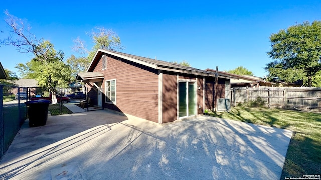 back of property featuring a patio area