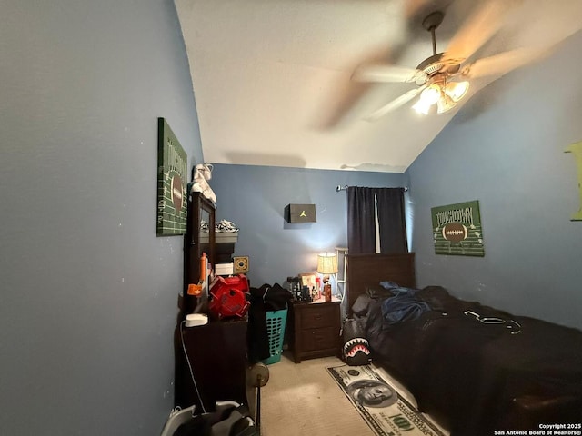 bedroom featuring vaulted ceiling and ceiling fan