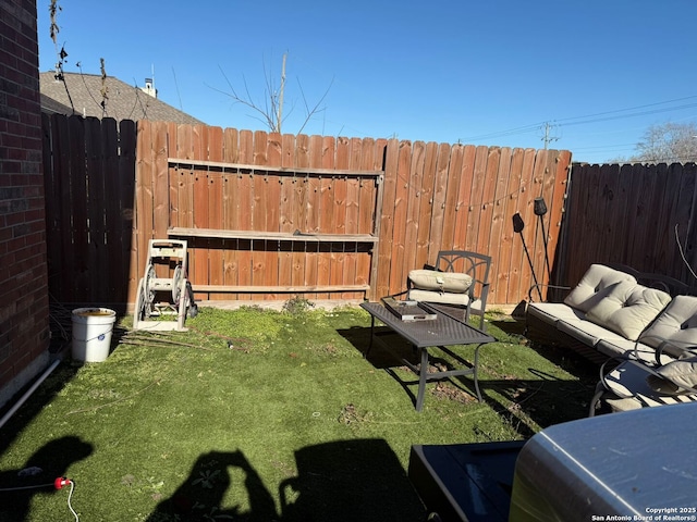 view of yard with outdoor lounge area