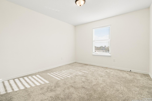 empty room featuring carpet floors