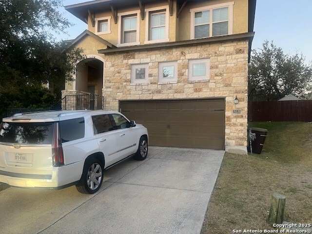 view of front of property featuring a garage