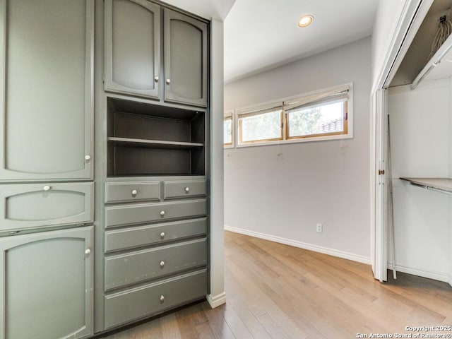 spacious closet featuring light hardwood / wood-style floors