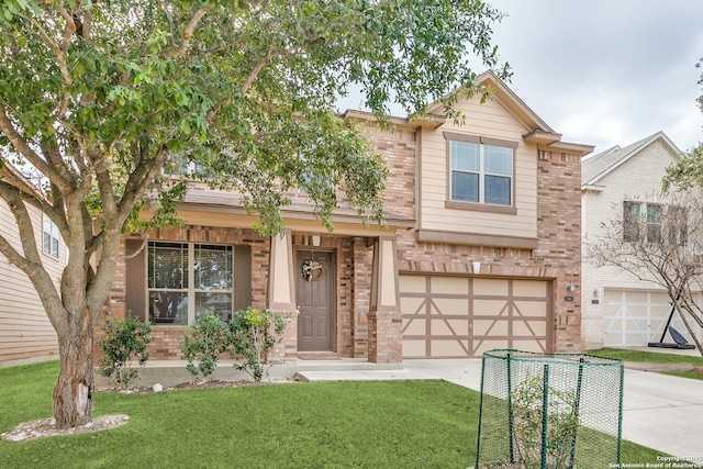 view of front of home featuring a garage and a front lawn