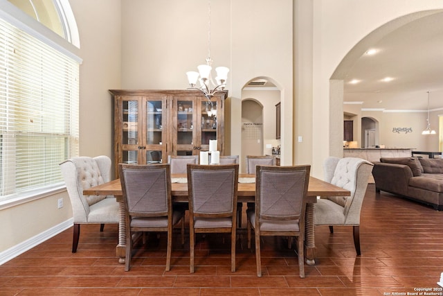 dining area featuring an inviting chandelier