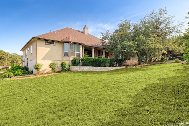 view of property exterior featuring a yard