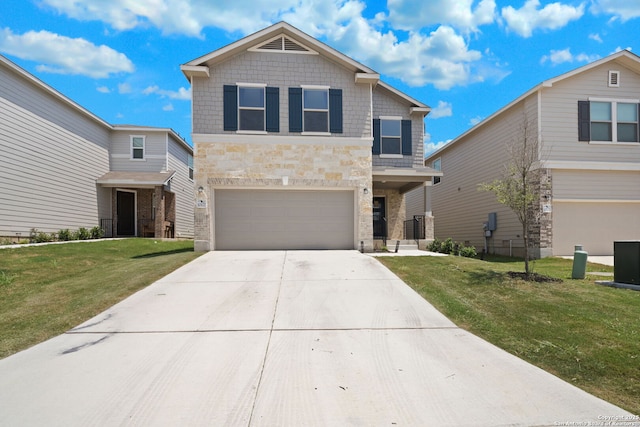 view of front facade with a garage and a front yard