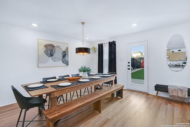 dining area with light wood-type flooring