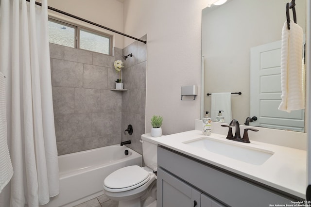 full bathroom featuring vanity, shower / bath combination with curtain, tile patterned floors, and toilet