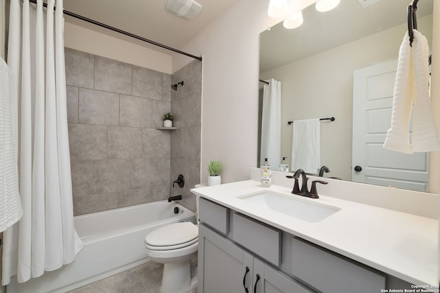 full bathroom with shower / bath combination with curtain, vanity, toilet, and tile patterned flooring