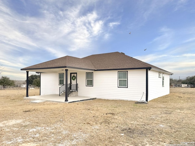 single story home featuring a patio