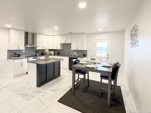 kitchen with wall chimney range hood, sink, white cabinets, and black dishwasher