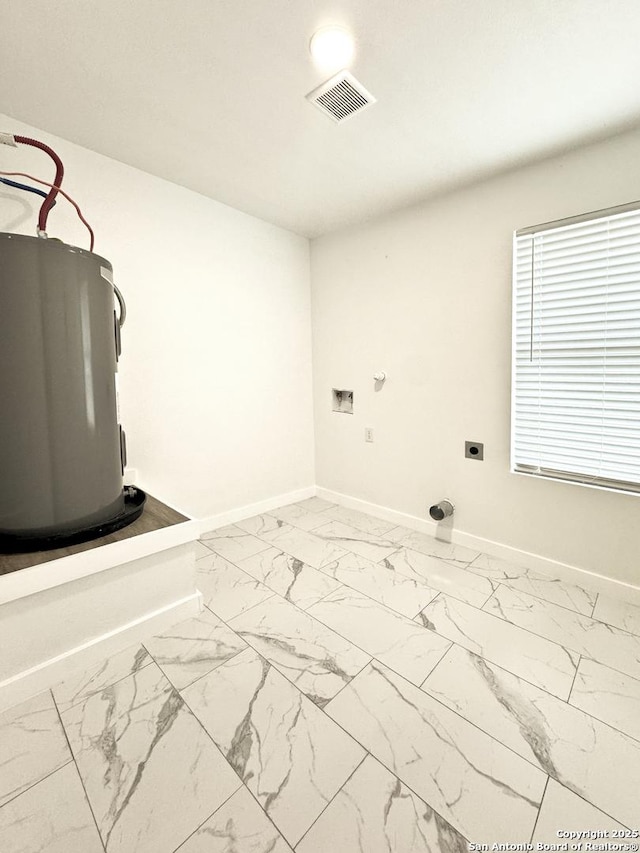 laundry area featuring hookup for a washing machine, water heater, and electric dryer hookup