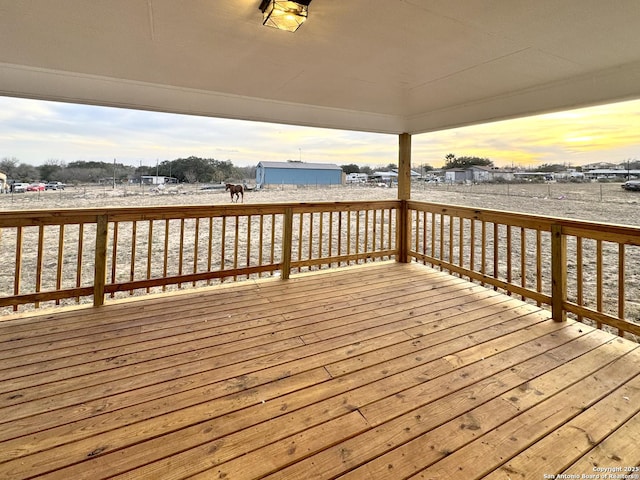 view of deck at dusk