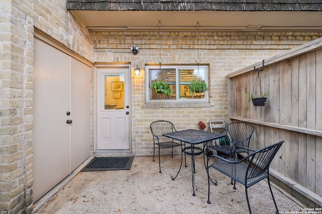 property entrance with a patio area