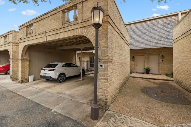 exterior space featuring a carport