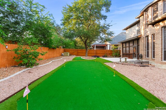 view of property's community with a patio