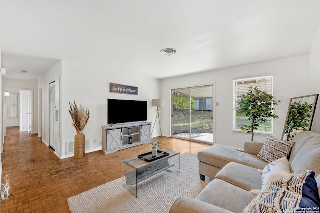 living room with parquet floors