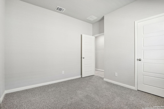 unfurnished bedroom with carpet floors