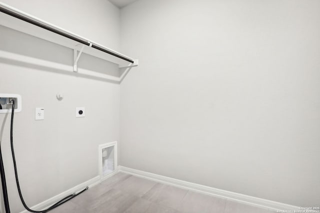 clothes washing area featuring gas dryer hookup, washer hookup, and hookup for an electric dryer