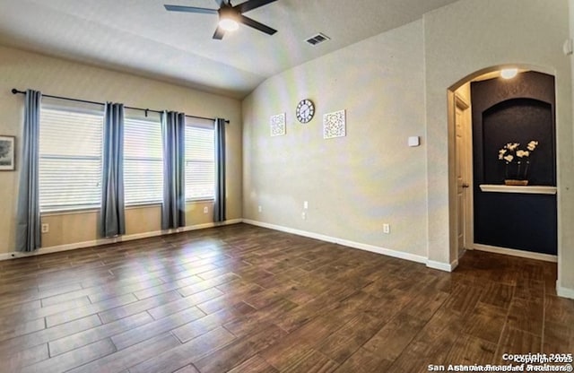 spare room with vaulted ceiling and ceiling fan