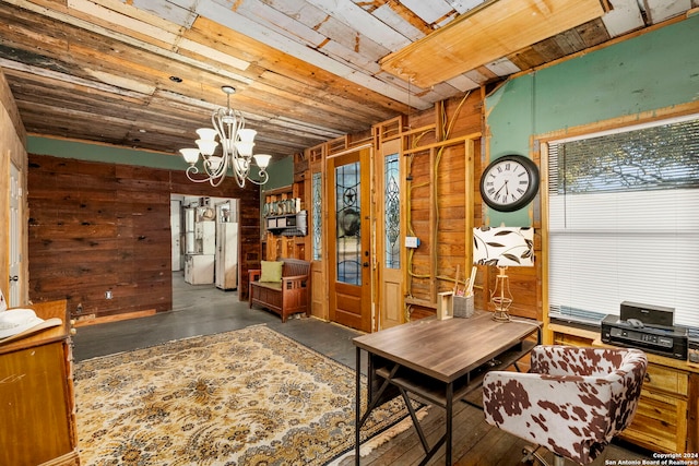 interior space featuring an inviting chandelier and wooden walls