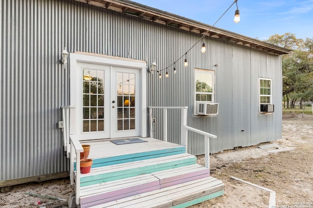 exterior space with french doors and cooling unit