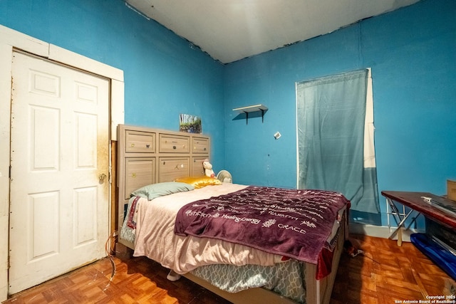 bedroom with parquet floors