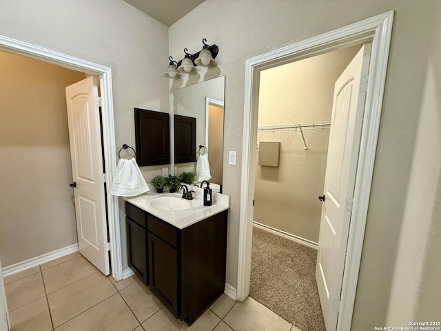 bathroom featuring tile patterned floors and vanity