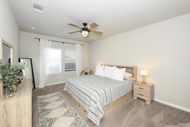 bedroom with ceiling fan and carpet flooring